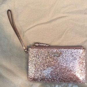 pink glittery Kate Spade wristlet. NEVER USED
